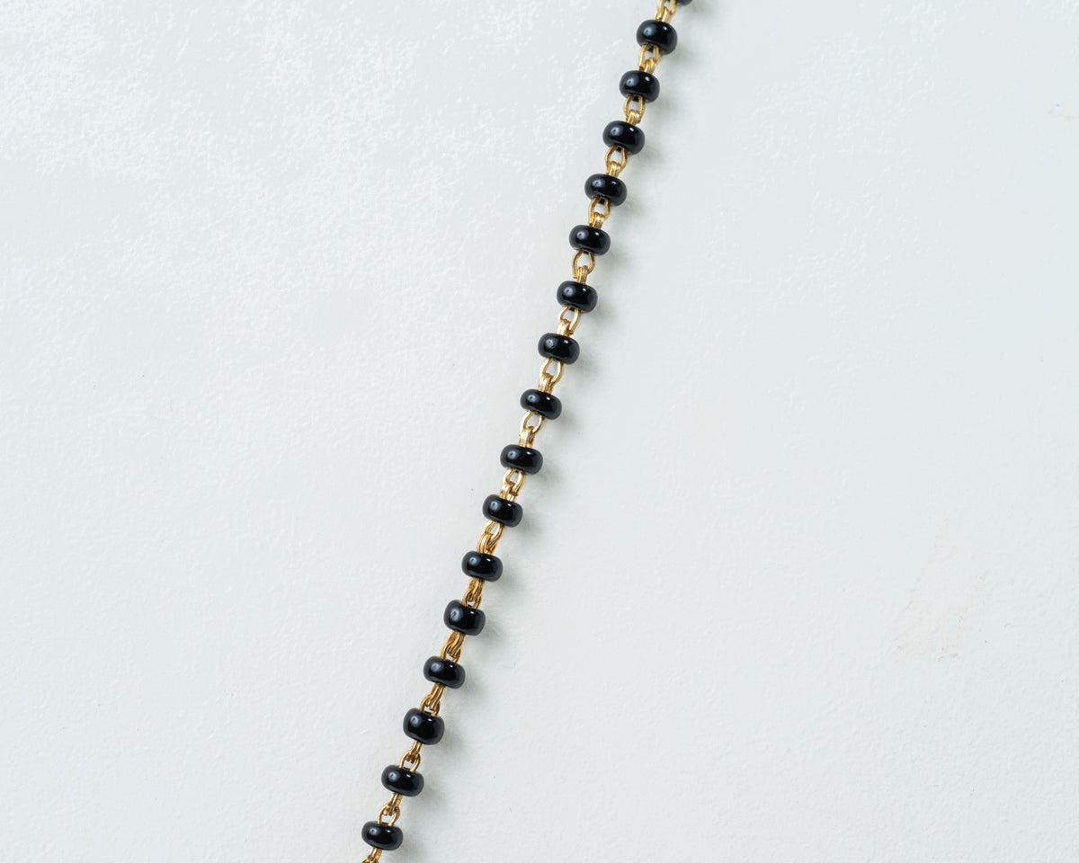 Single-Line Black Bead Mangalsutra Set with Gold-Plated Beaded Pendant & Stud Earrings