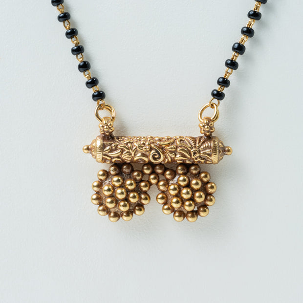 Single-Line Black Bead Mangalsutra Set with Gold-Plated Beaded Pendant & Stud Earrings