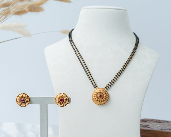 Double-Line Black Bead Mangalsutra Set with Gold-Plated Floral Pendant & Earrings