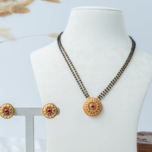 Double-Line Black Bead Mangalsutra Set with Gold-Plated Floral Pendant & Earrings