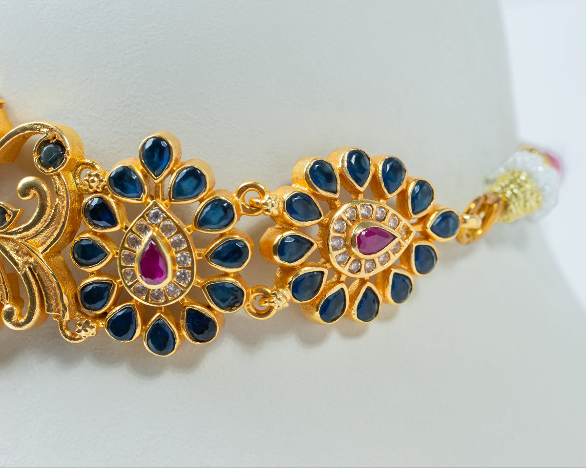 Gold-Plated Peacock Choker Necklace with Ruby & Blue Stone Work