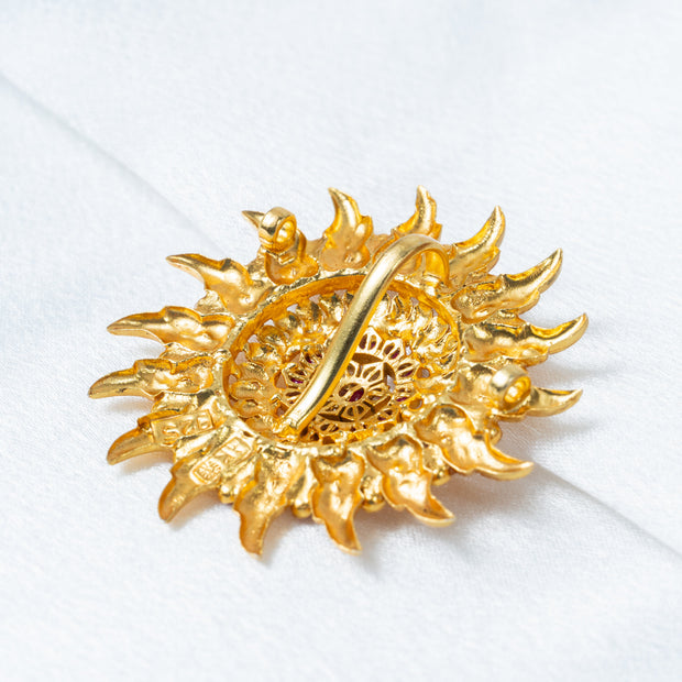 Gold-Plated Sunburst Temple Pendant with Ruby & White Stones