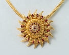 Gold-Plated Sunburst Temple Pendant with Ruby & White Stones