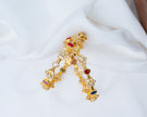 Gold-Plated Navratna Floral Stone Bangles with White Crystal Accents