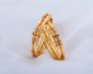 Traditional Gold-Plated Floral Design Openable Bangles with Ruby Stone Accents