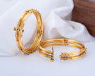 Traditional Gold-Plated Floral Design Openable Bangles with Ruby Stone Accents