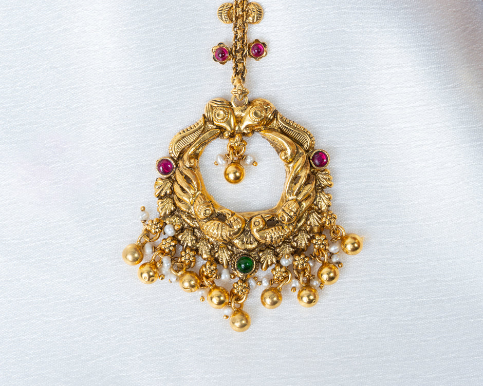 Traditional Gold-Plated Peacock Nakshi Maang Tikka with Ruby & Green Stones