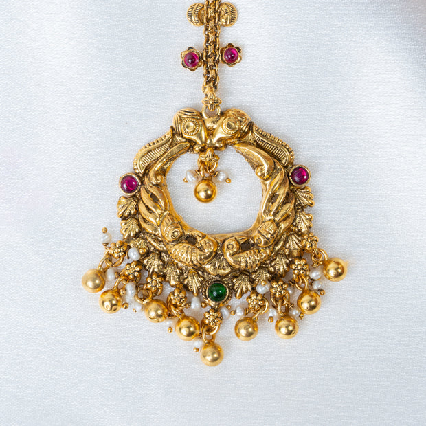Traditional Gold-Plated Peacock Nakshi Maang Tikka with Ruby & Green Stones