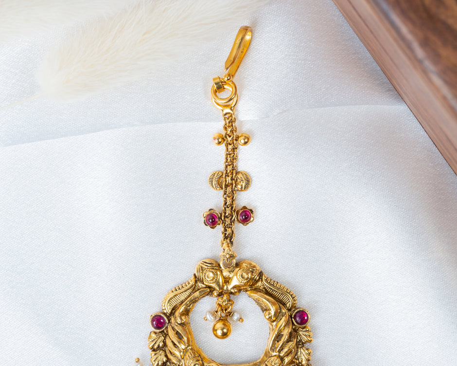 Traditional Gold-Plated Peacock Nakshi Maang Tikka with Ruby & Green Stones