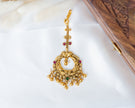 Traditional Gold-Plated Peacock Nakshi Maang Tikka with Ruby & Green Stones