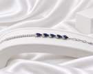 Silver Tone Blue Teardrop Five-Stone Bracelet