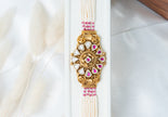 Traditional Pearl & Ruby Kundan Bracelet with Floral Centerpiece