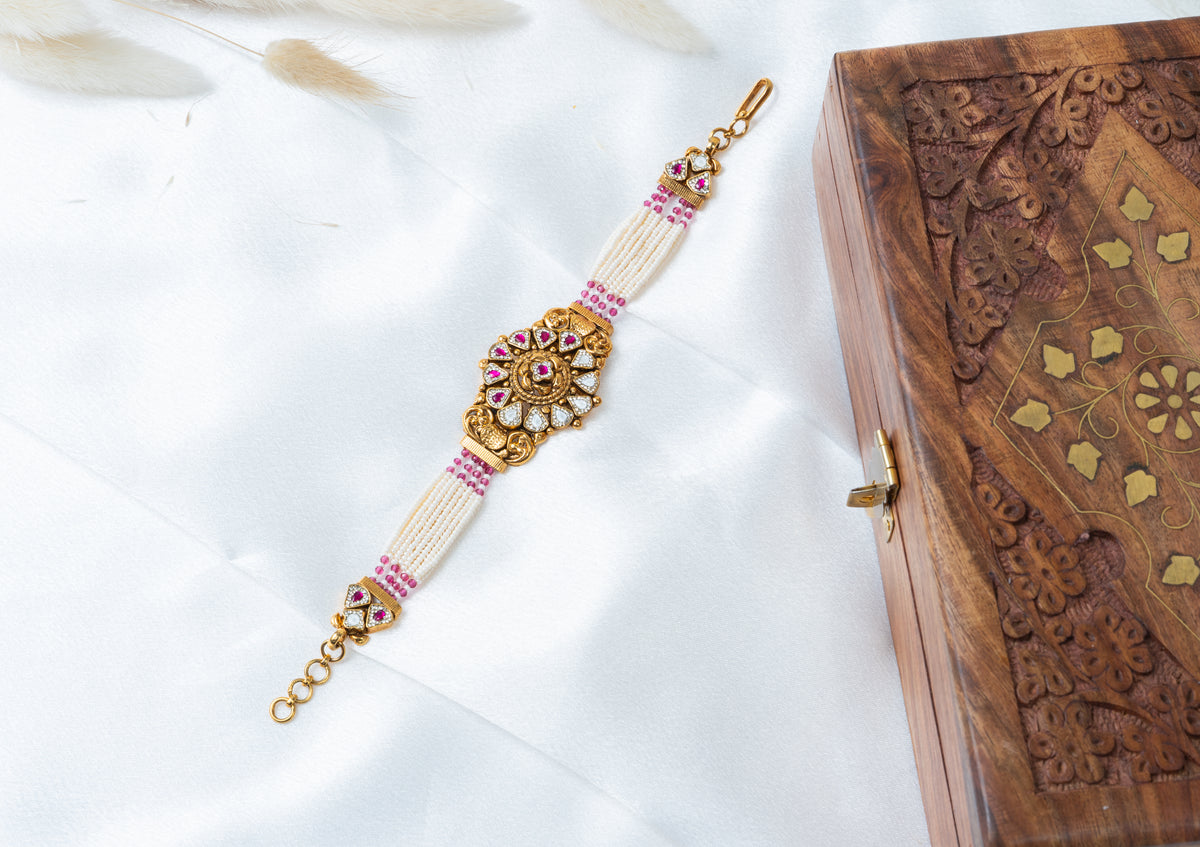 Traditional Pearl & Ruby Kundan Bracelet with Floral Centerpiece