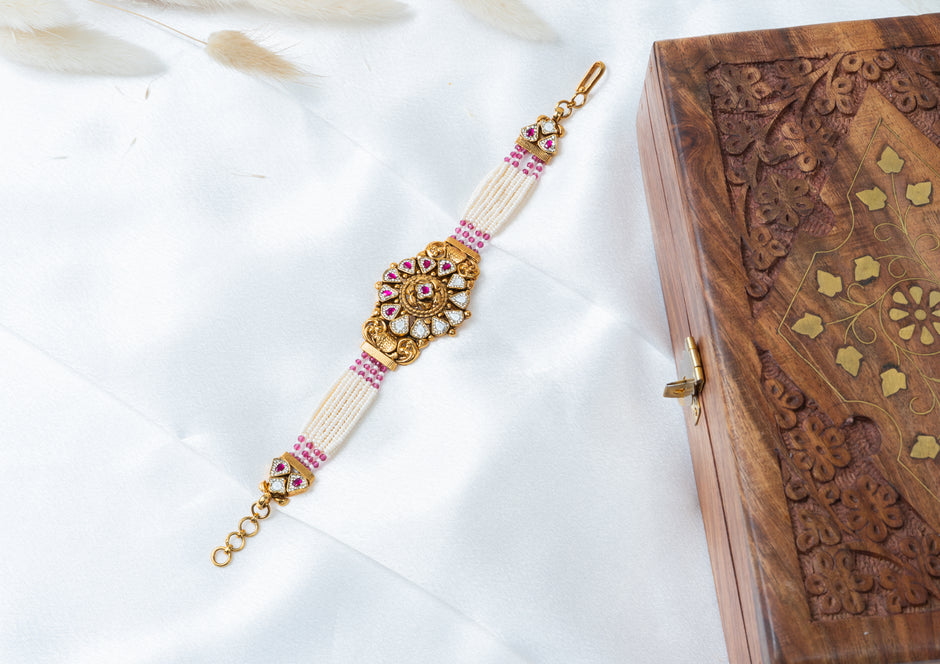 Traditional Pearl & Ruby Kundan Bracelet with Floral Centerpiece
