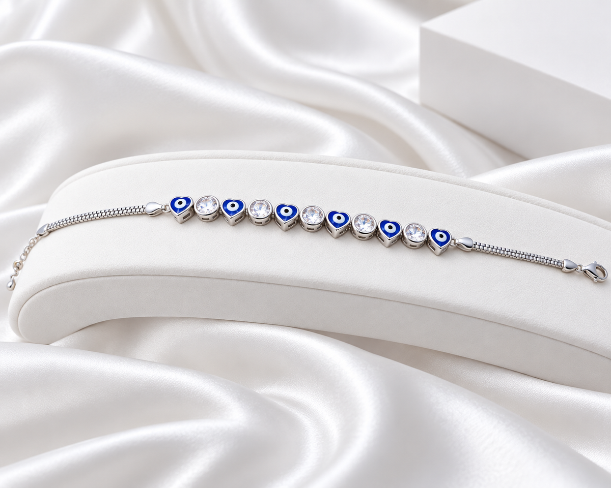 Silver Tone Blue Heart Evil Eye Bracelet with Clear Stones