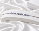 Silver Tone Blue Heart Evil Eye Bracelet with Clear Stones