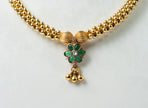 Traditional Gold-Tone Beaded Necklace with Green Floral Pendant