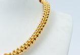 Traditional Gold-Tone Beaded Necklace with Green Floral Pendant
